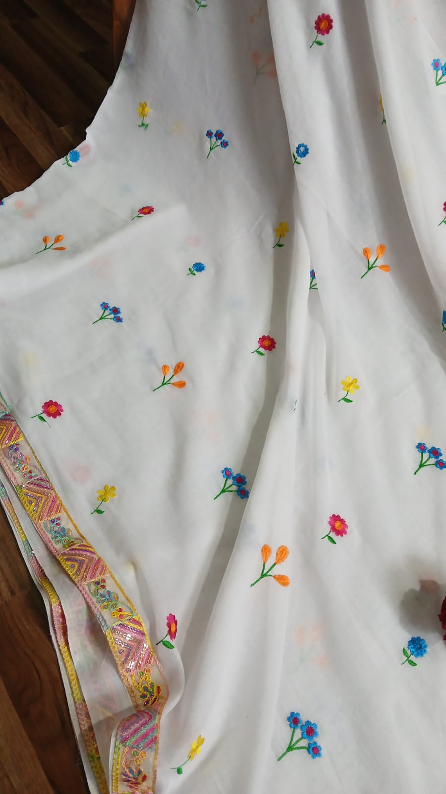 WHITE BASE EMBROIDERY AND GUJRATI WORK ZARI BORDER