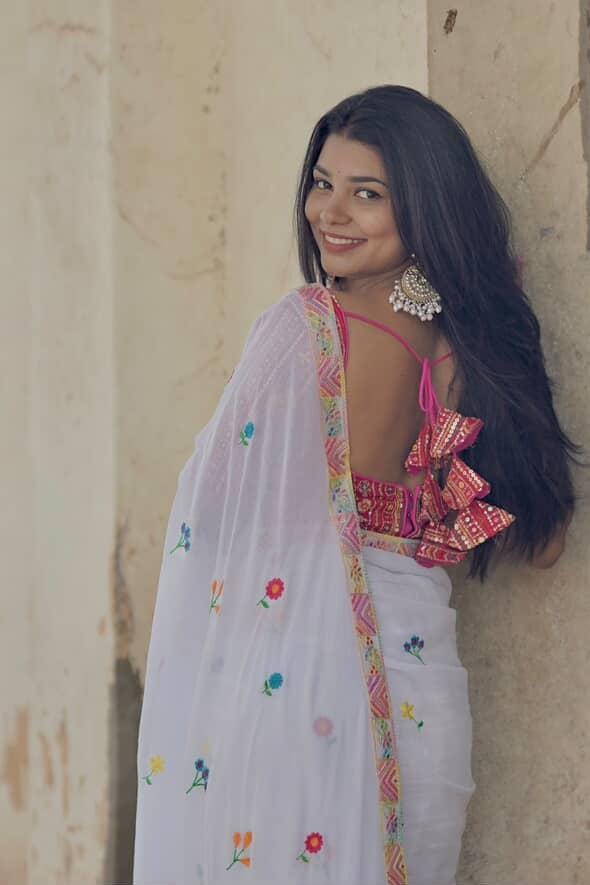 WHITE BASE EMBROIDERY AND GUJRATI WORK ZARI BORDER